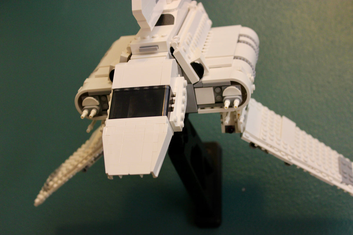 Close-up of the LEGO Imperial Lambda-Class Shuttle 75459 cockpit on its black wall mount