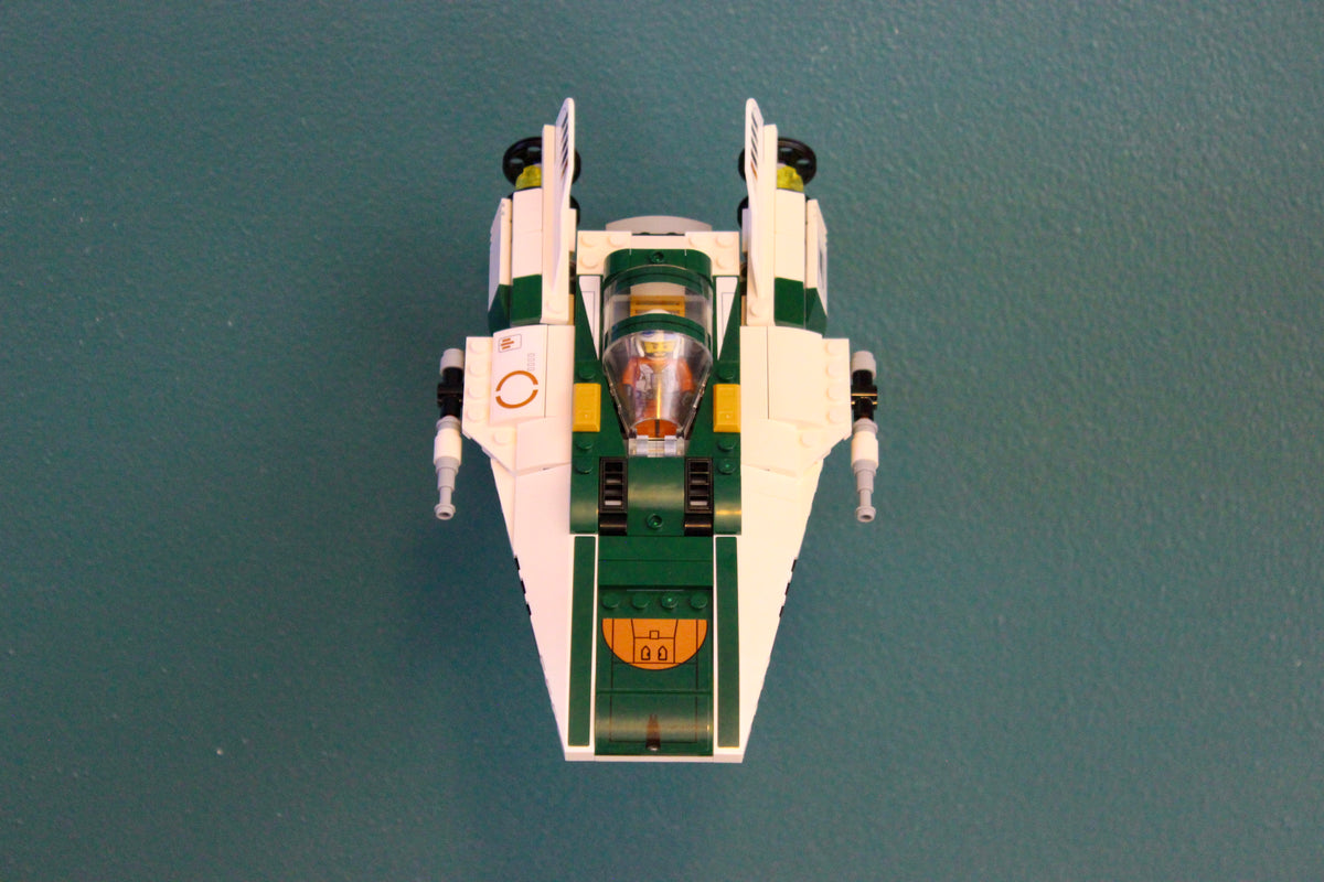 LEGO Resistance A-Wing Starfighter 75248 mounted on the wall, front view