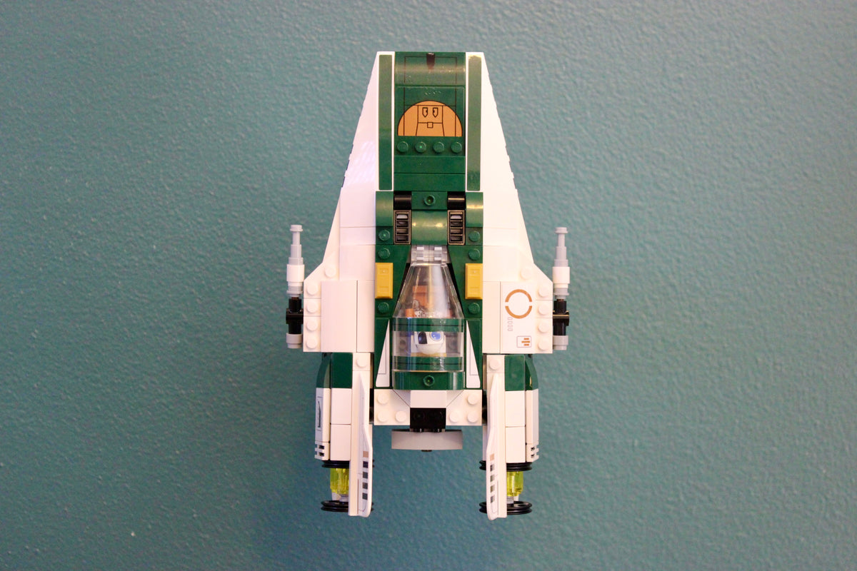 LEGO Resistance A-Wing Starfighter 75248 displayed nose-up on the wall