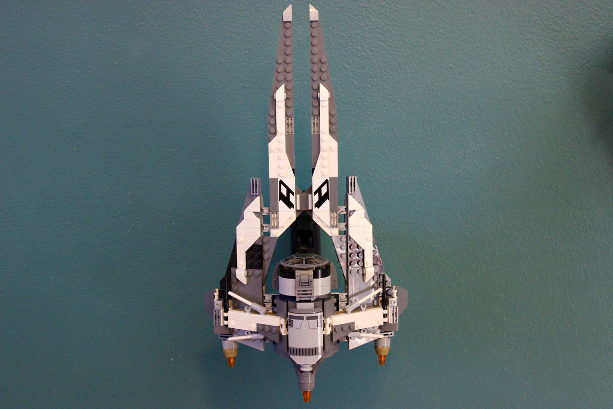 LEGO Black Ace TIE Interceptor 75242 displayed nose-up on the wall, rear view