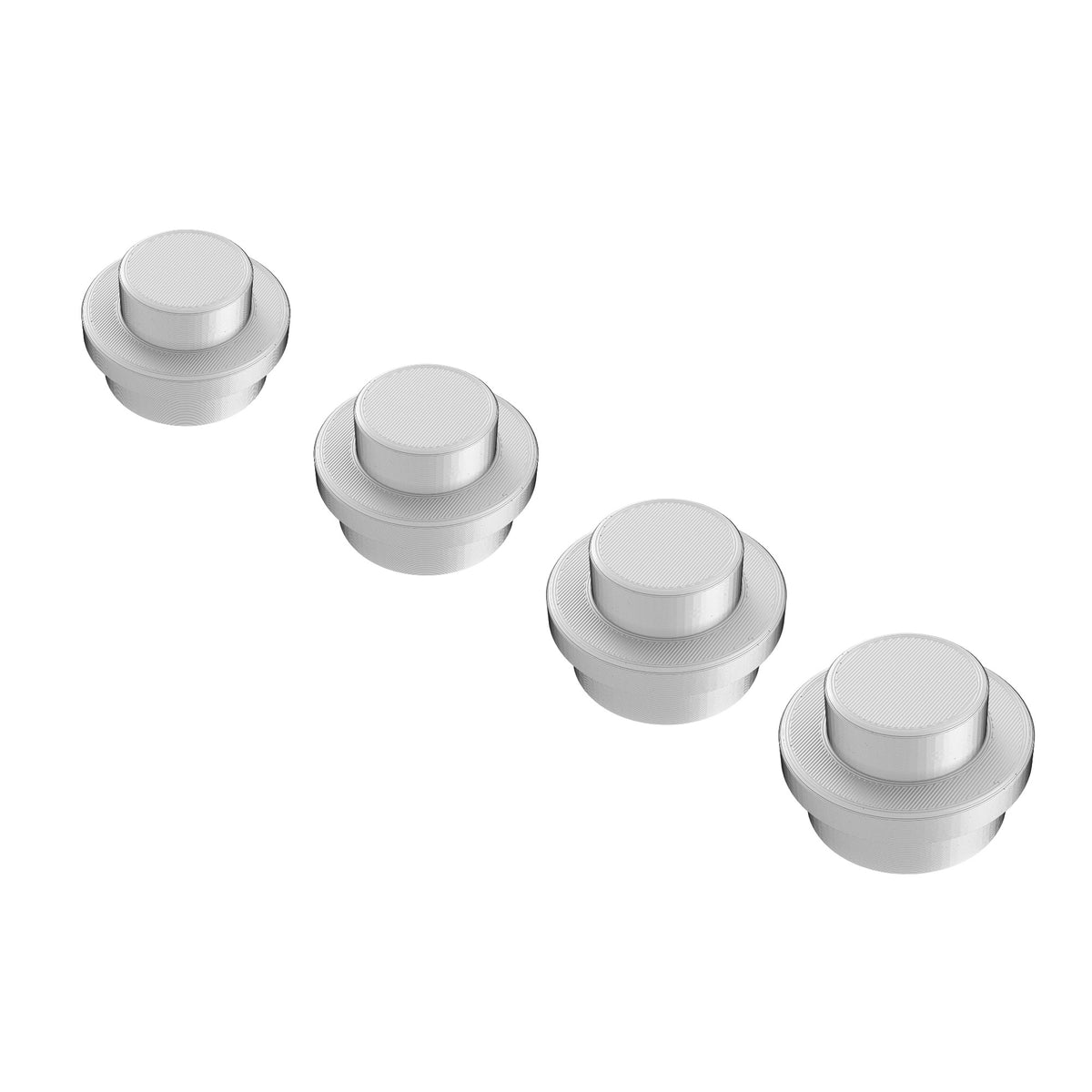 Four giant silver brick studs in a row on a white background
