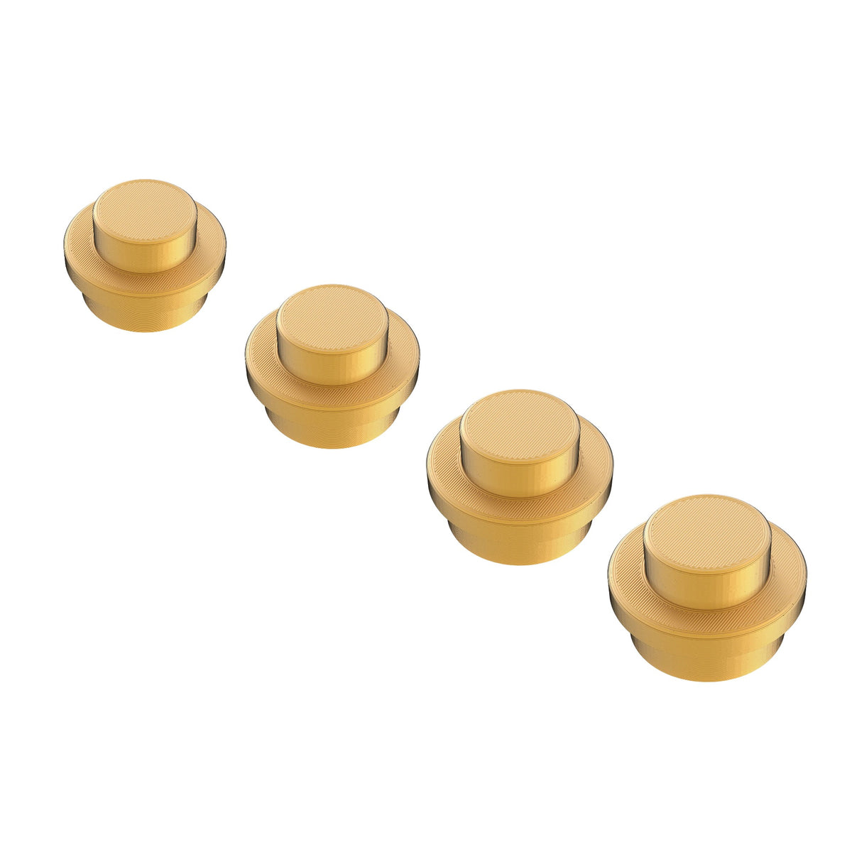 Four giant gold brick studs in a row on a white background